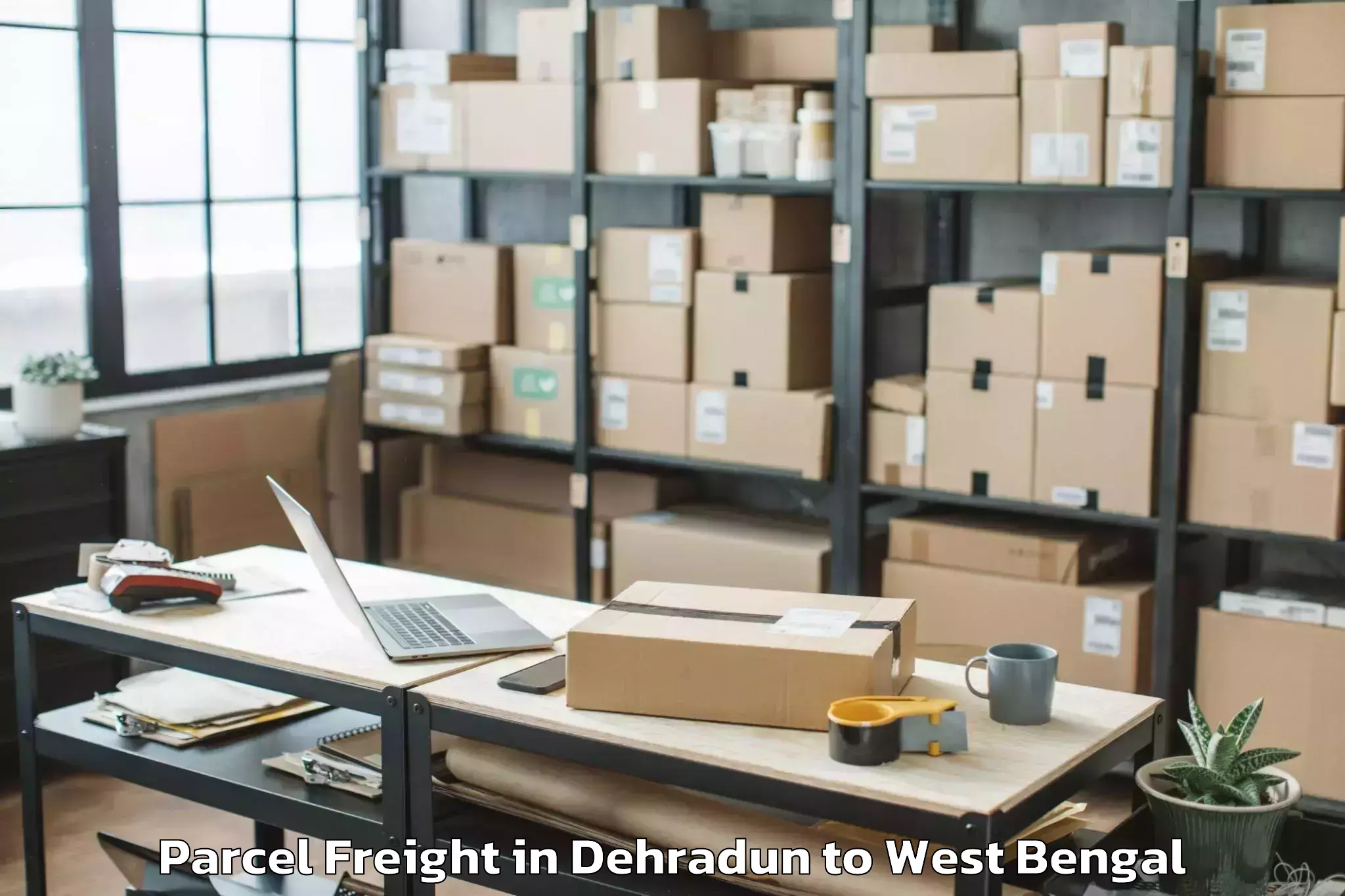 Leading Dehradun to Ingraj Bazar Parcel Freight Provider